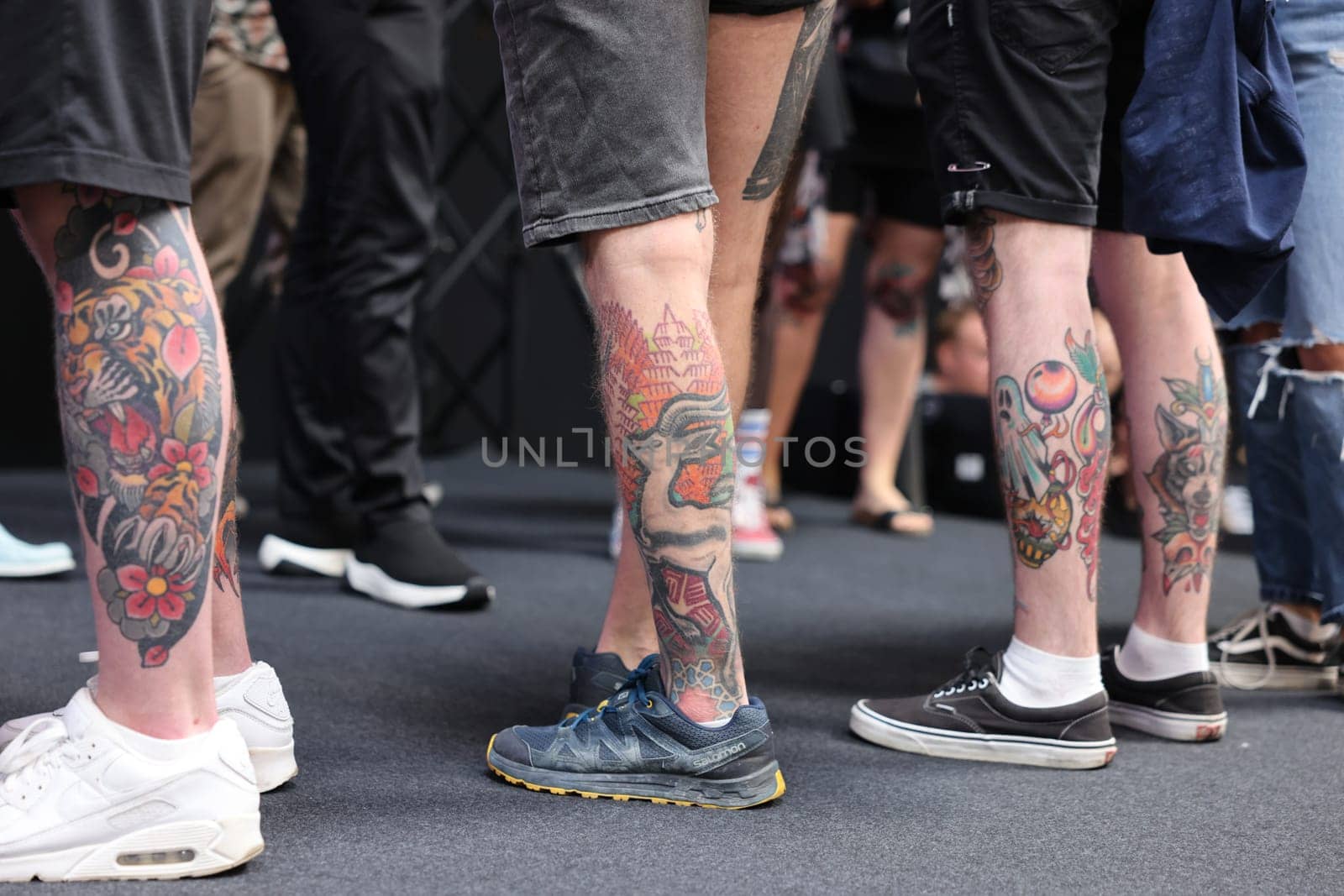 Krakow, Poland - June 11, 2022: Unidentified participant during the contest for the best tattoo at the 15th Tattoofest Convention in Cracow. One of the most prestigious tattoo festivals.