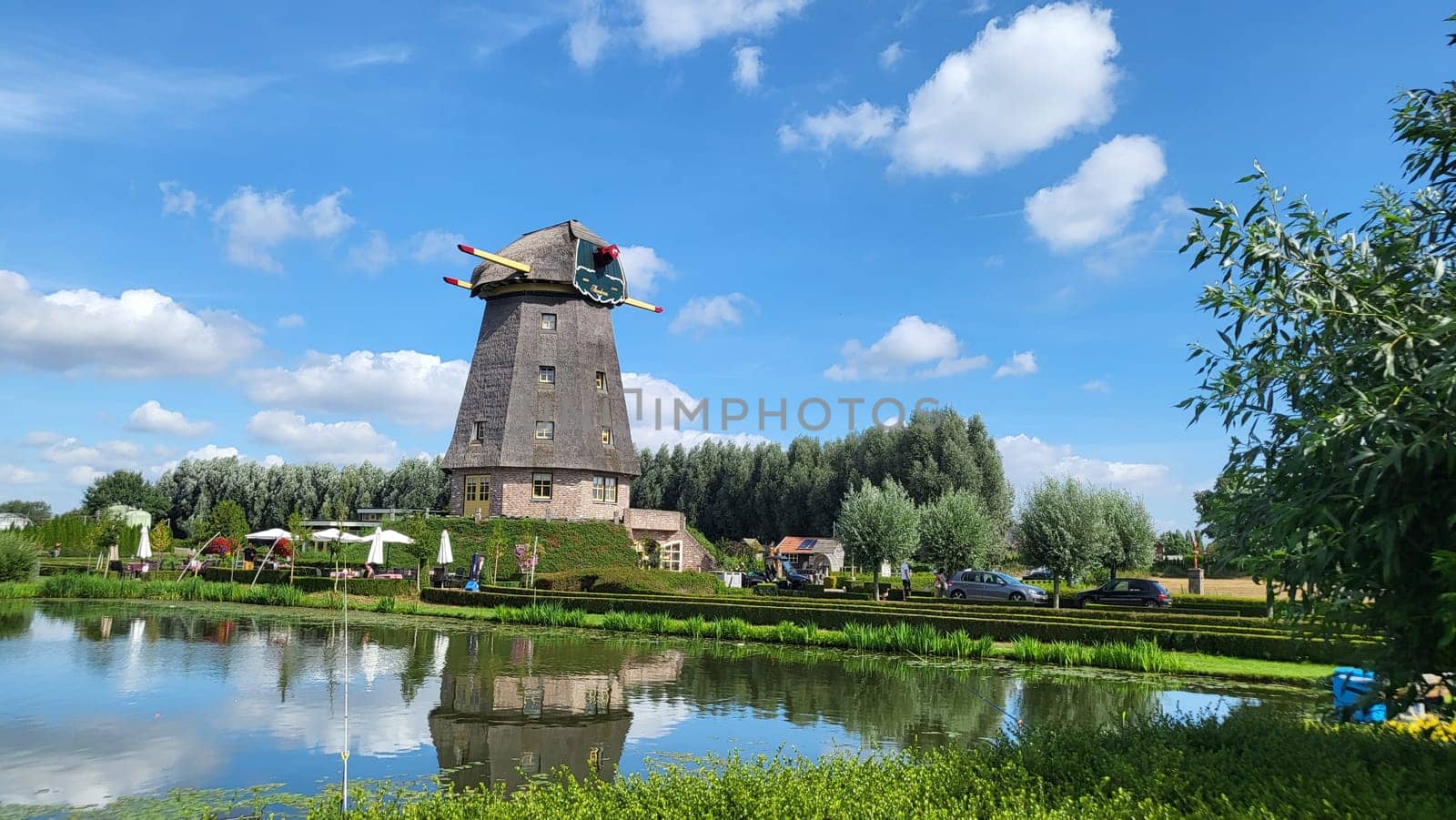 Blitterswijck, The Netherlands - August 21, 2022: Campers parked on a Camer Van pitch. Concept camper van leisure and fun