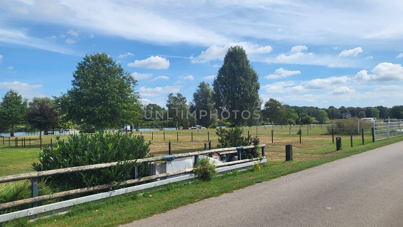 Blitterswijck, The Netherlands - August 21, 2022: Campers parked on a Camer Van pitch. Concept camper van leisure and fun