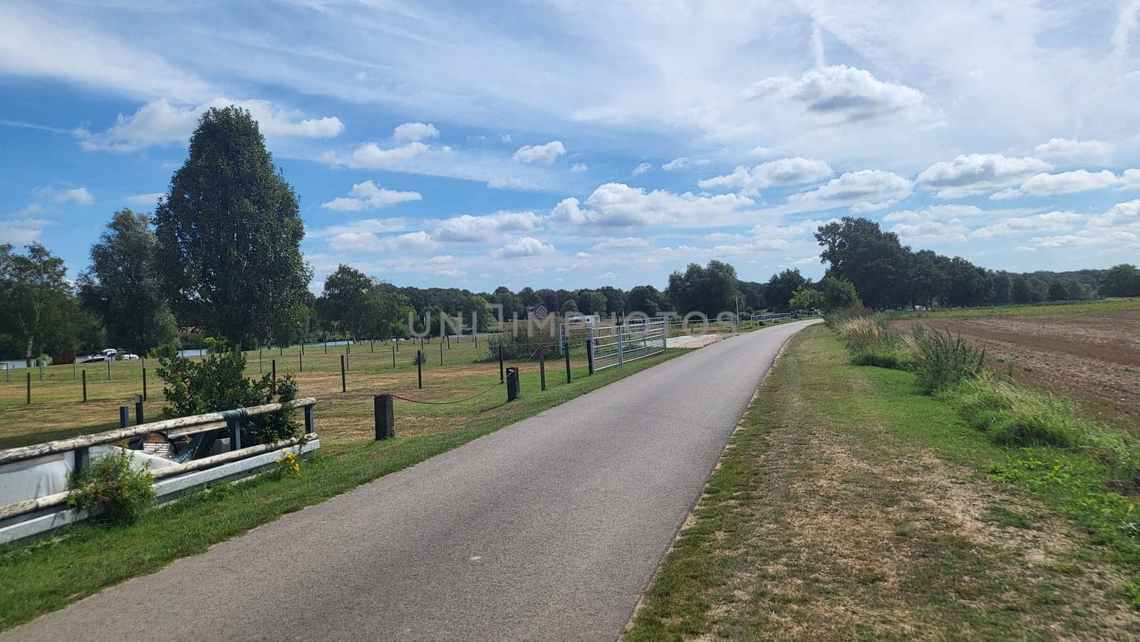 Blitterswijck, The Netherlands - August 21, 2022: Campers parked on a Camer Van pitch. Concept camper van leisure and fun