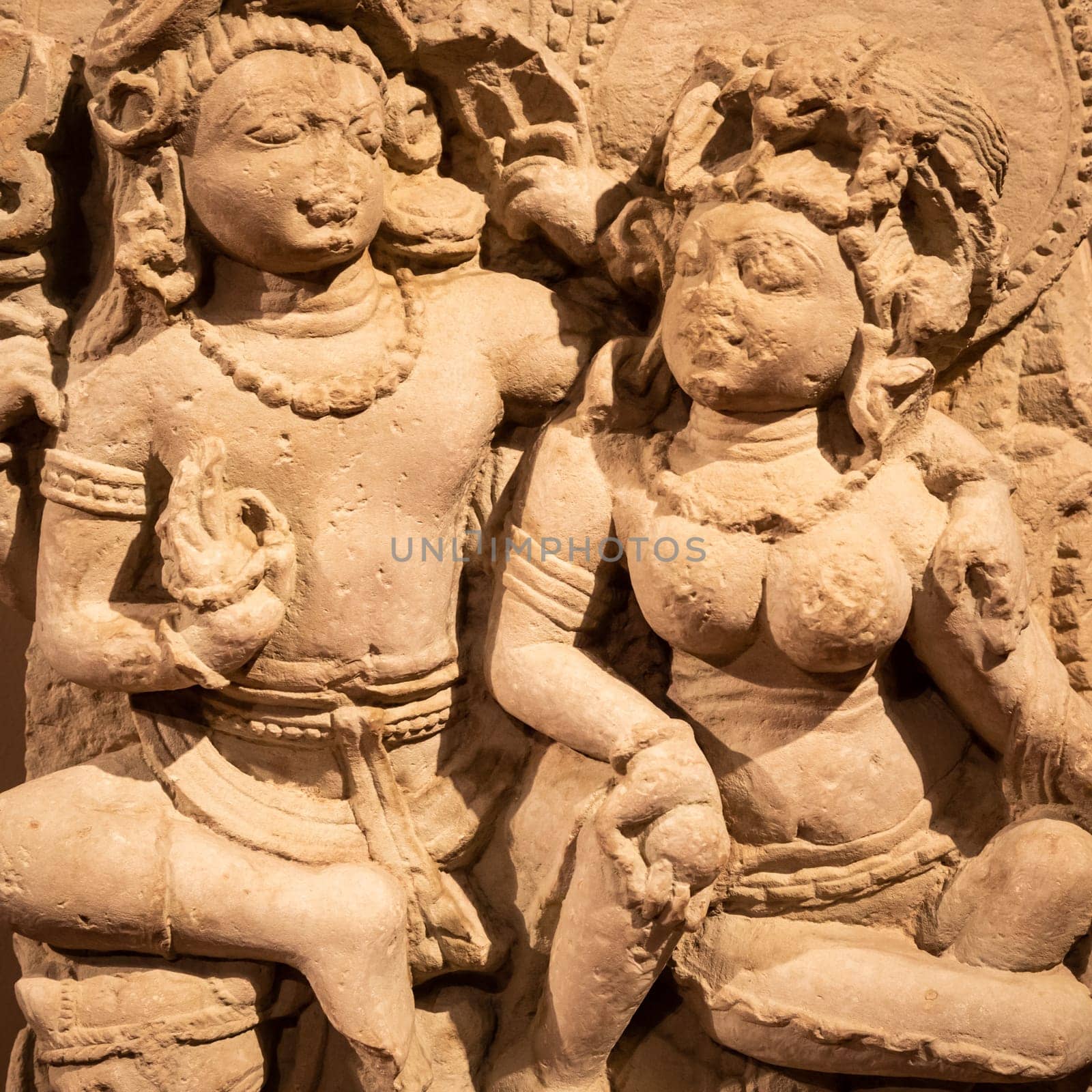 Turin, Italy - May 2023: Oriental Art Museum - Shiva, the Hindu god, with his wife Parvati. Concept for tantra, Kamasutra, tantric sex
