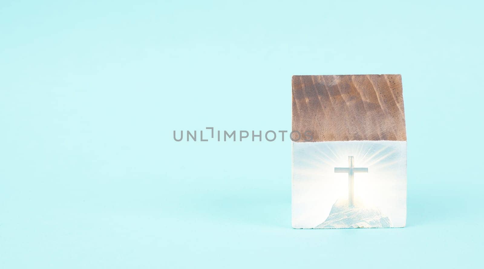 Wooden house with a religious cross, christian church, belief and faith concept, catholic and protestant community