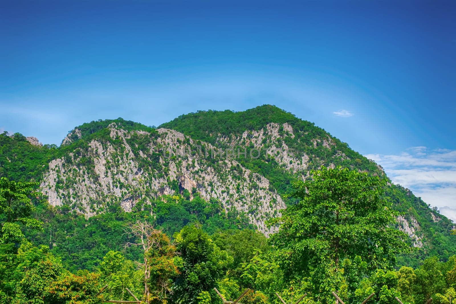 Good atmosphere, forests, mountains and blue cloudy sky are landscape in Thailand.