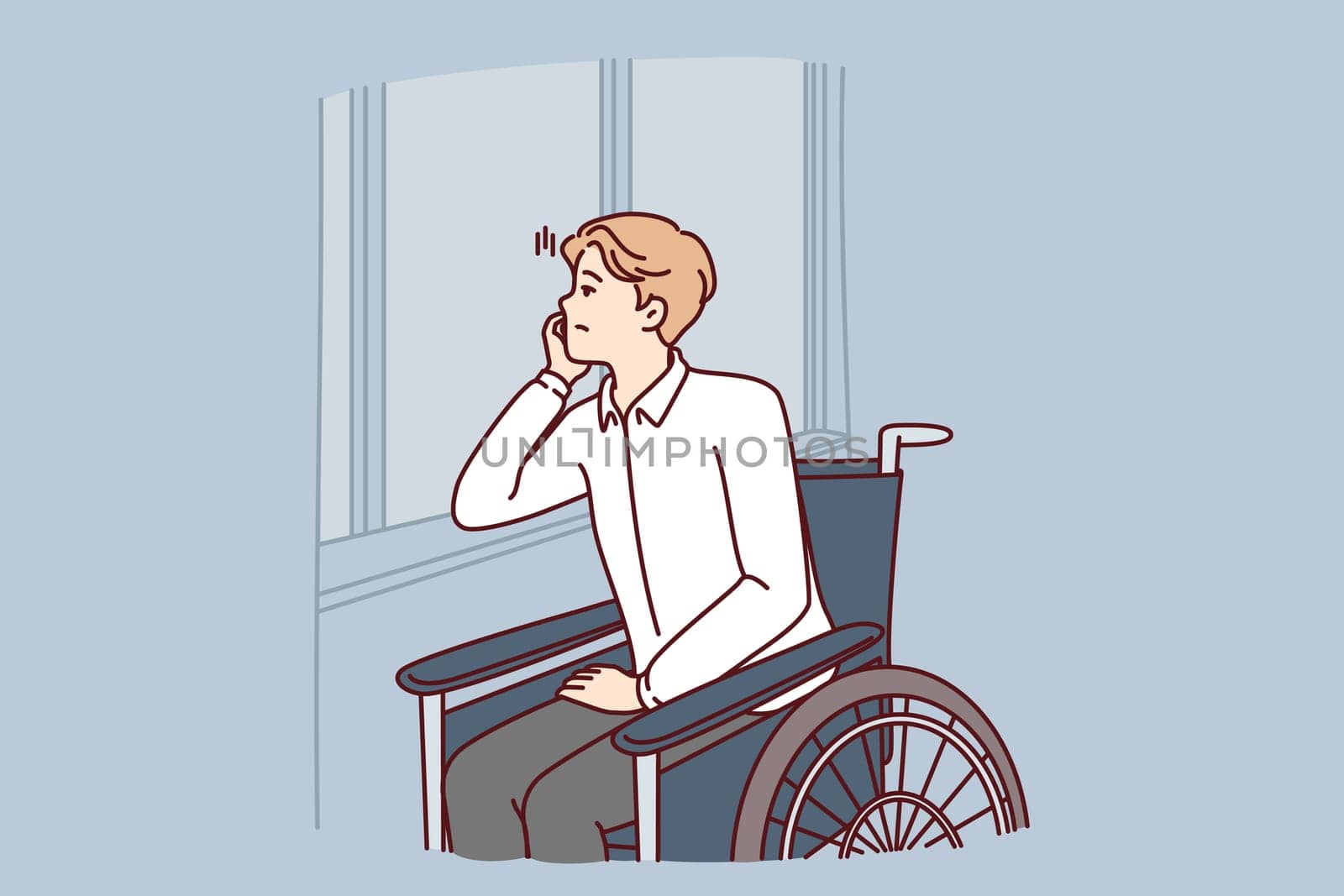 Unhappy handicapped man sits in wheelchair and sadly looks out window suffering from loneliness and lack of opportunity for walk. Handicapped guy needs psychological and moral support from friends
