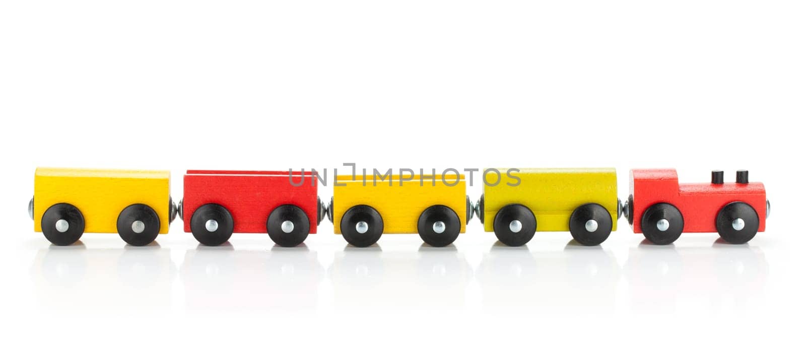 Wooden toy colored train. Isolated on white background