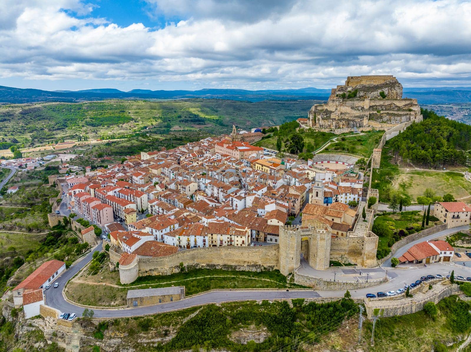 Morella in Castellon, side aerial view of the towers of Sant Miquel, Spain