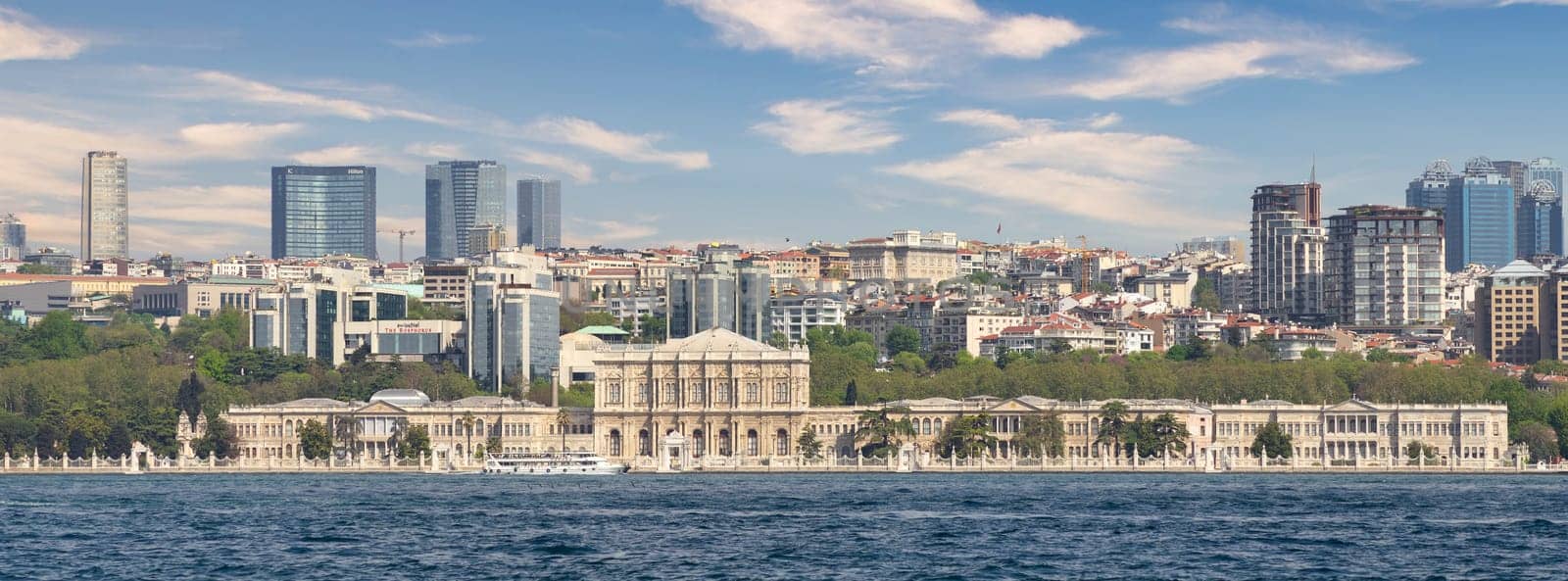 View from the European coast of the Bosporus strait of Dolmabahce Palace, located at Besiktas district of Istanbul, Turkey, main administrative center of the Ottoman Empire formerly