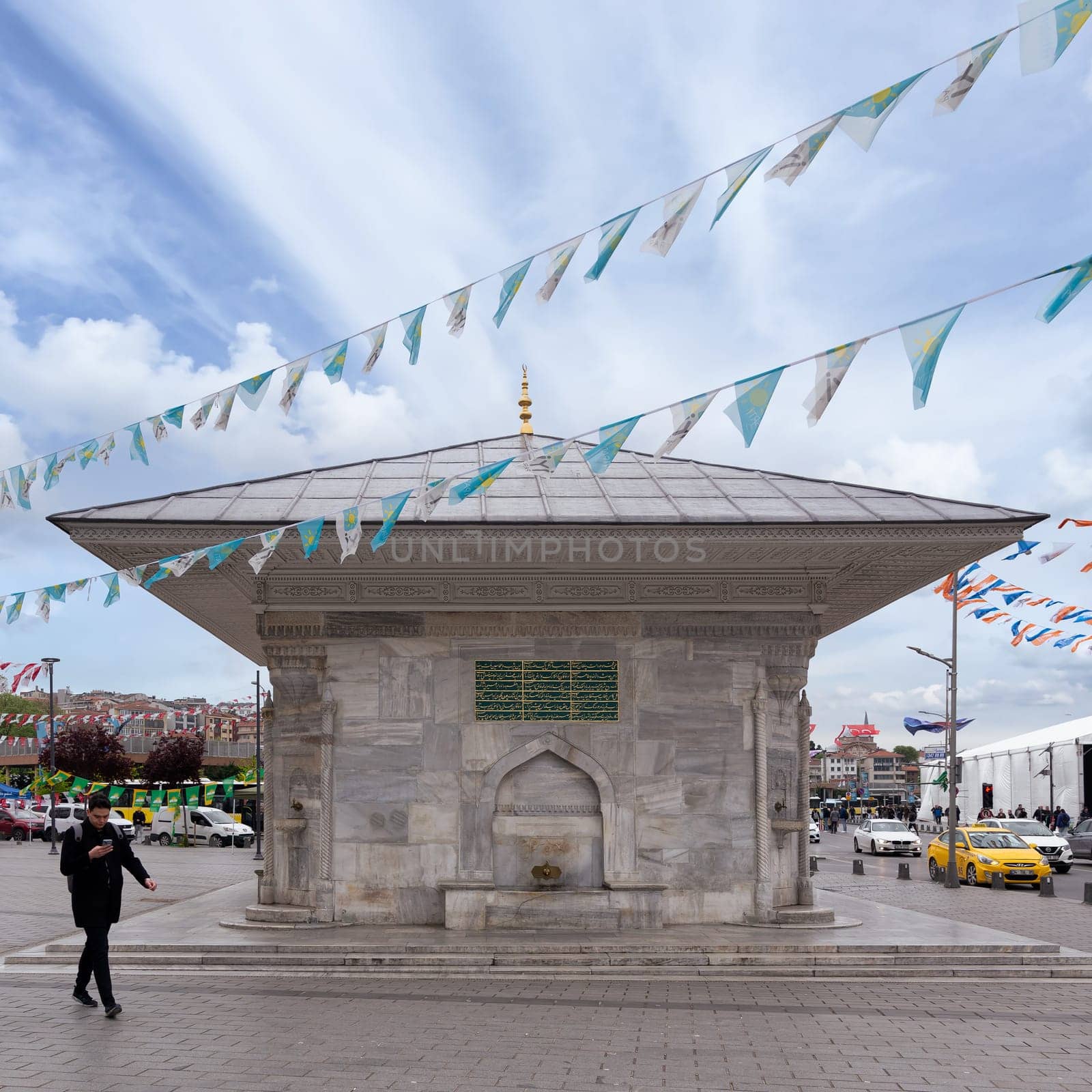 Istanbul, Turkey - May 5, 2023: Fountain of Ahmed III, or Ahmet Cesmesi, an 18th century public water fountain, or Sabil, built by Sultan Mahmud III, suited at Uskudar District