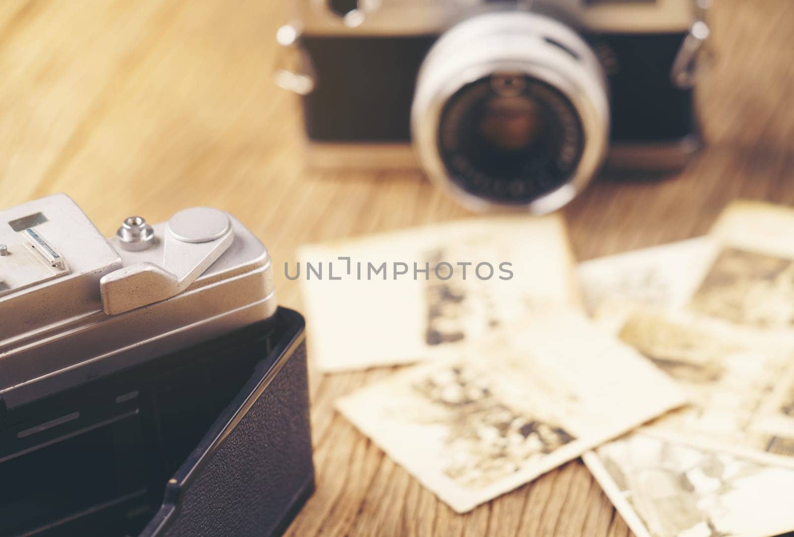 vintage camera on the background of old photos