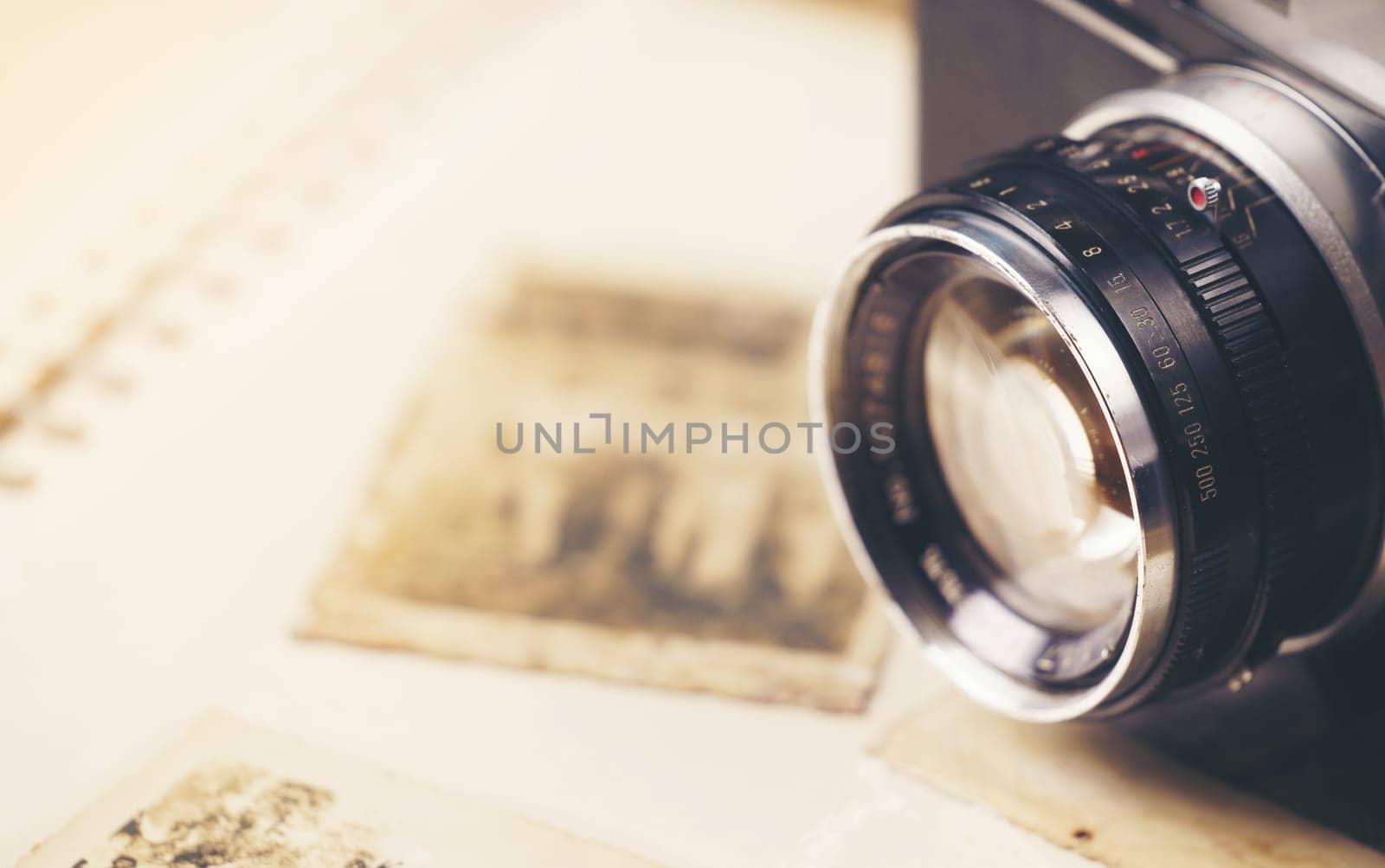 vintage camera on the background of old photos