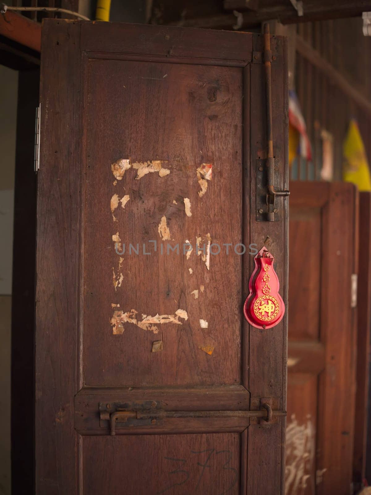 Brown wood door pattern in Thai style for exterior home decoration texture and background . space for text