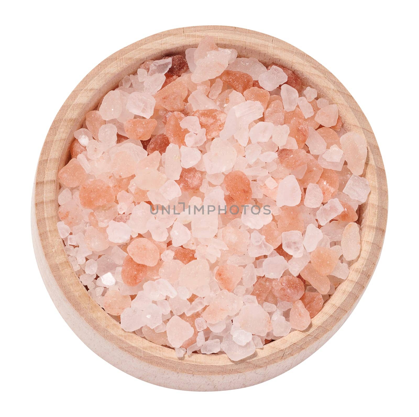 White and pink Himalayan salt in a wooden bowl on a white isolated background, top view