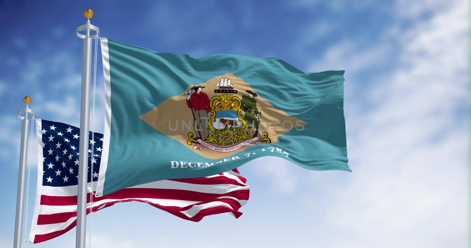 Delaware state flag waving in the wind with the National flag of the United States on a clear day. 3d illustration render. Fluttering fabric