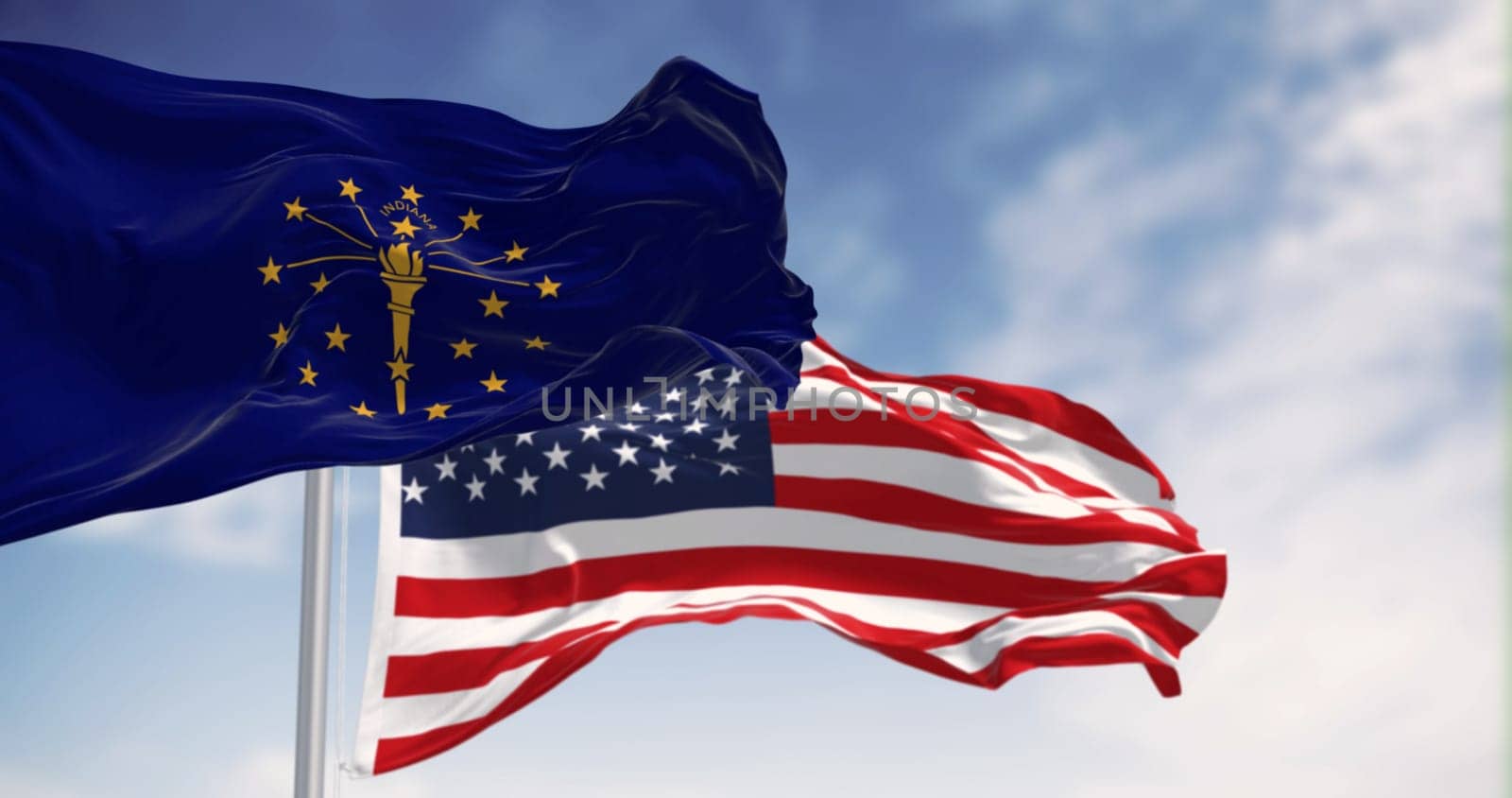 Indiana state flag waving with the national flag of the United states on a clear day. 3d illustration render. Fluttering fabric