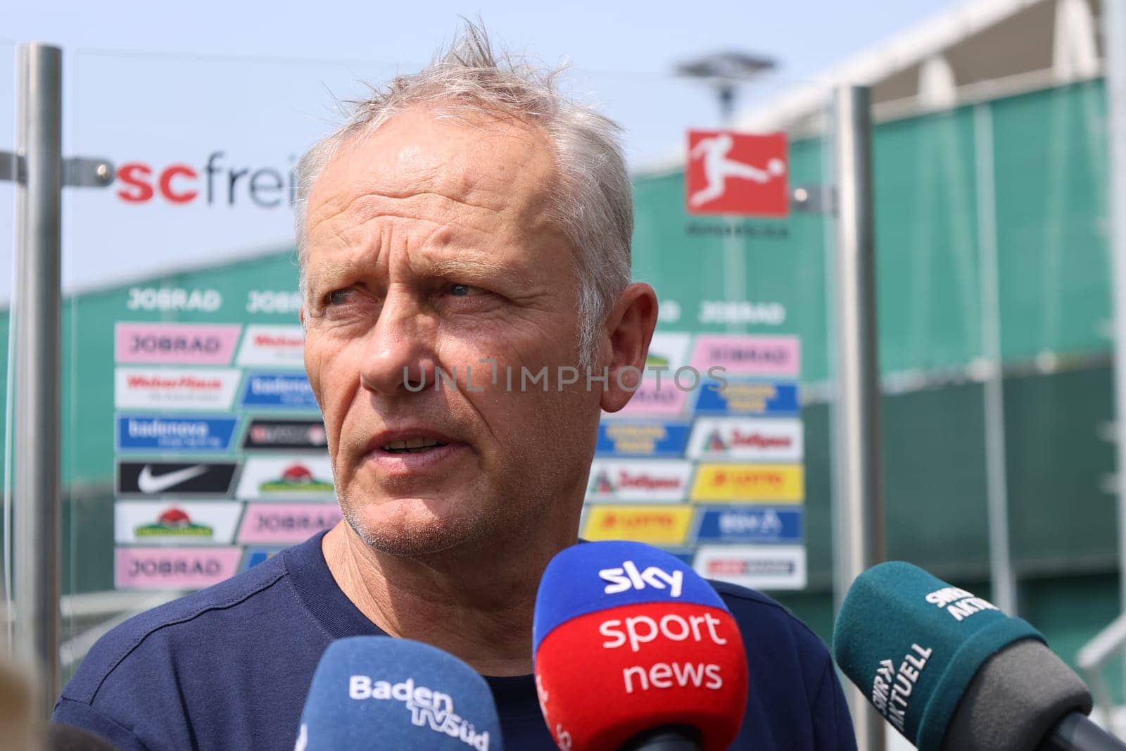 Sought-after interview partner: Coach Christian Streich (SC Freiburg) after the first training session at the start of training for Bundesliga club SC Freiburg 2023  DFL REGULATIONS PROHIBIT ANY USE OF PHOTOGRAPHS AS IMAGE SEQUENCES AND/OR QUASI-VIDEONann  Photo: Joachim Hahne/johapress