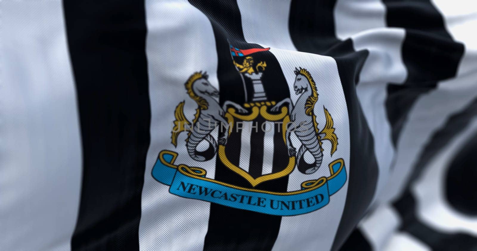 Newcastle, UK, July 2 2023: Fabric background with the Newcastle United flag waving. Illustrative editorial 3d illustration render. Close-up. Textured fabric background. Selective focus