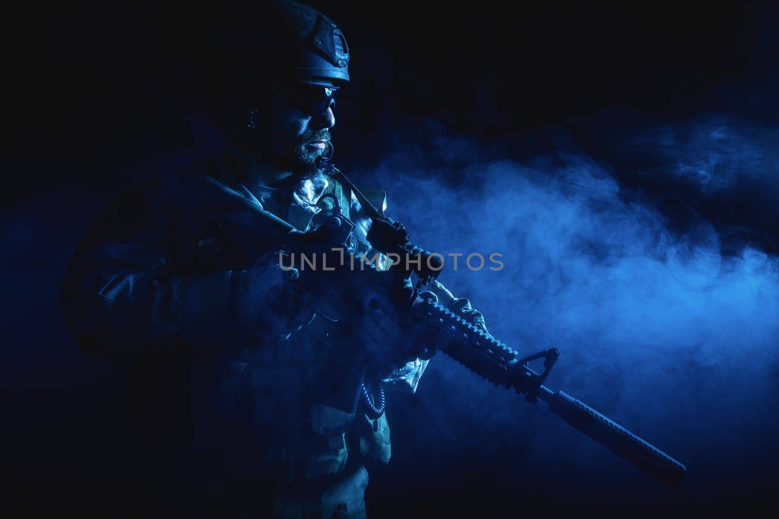 Bearded special forces soldier in the smoke