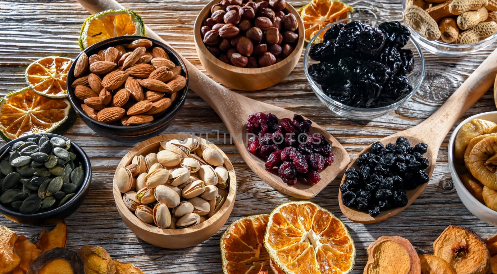 Composition with a variety of dried fruits and assorted nuts. Delicacies.