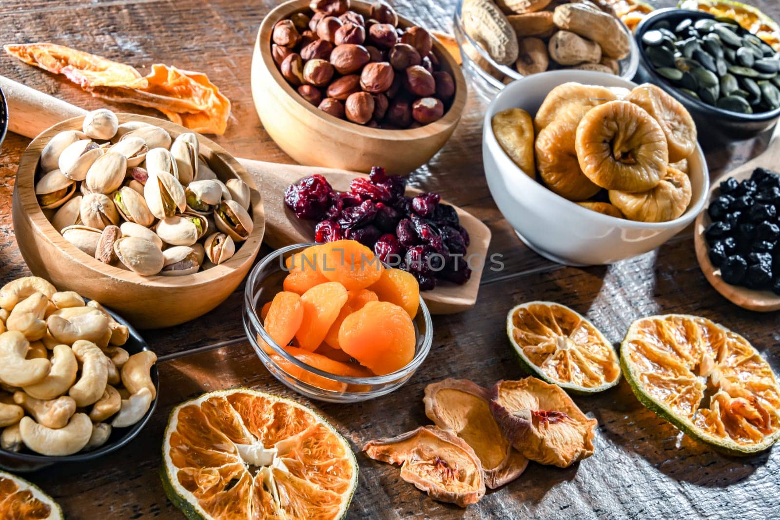 Composition with a variety of dried fruits and assorted nuts. Delicacies.