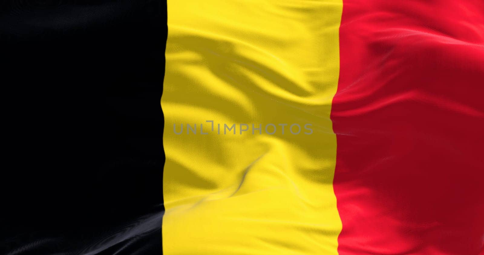 Close-up of the national flag of Belgium waving. Three equal vertical bands: black, yellow and red. 3d illustration render. European country. Rippled fabric.