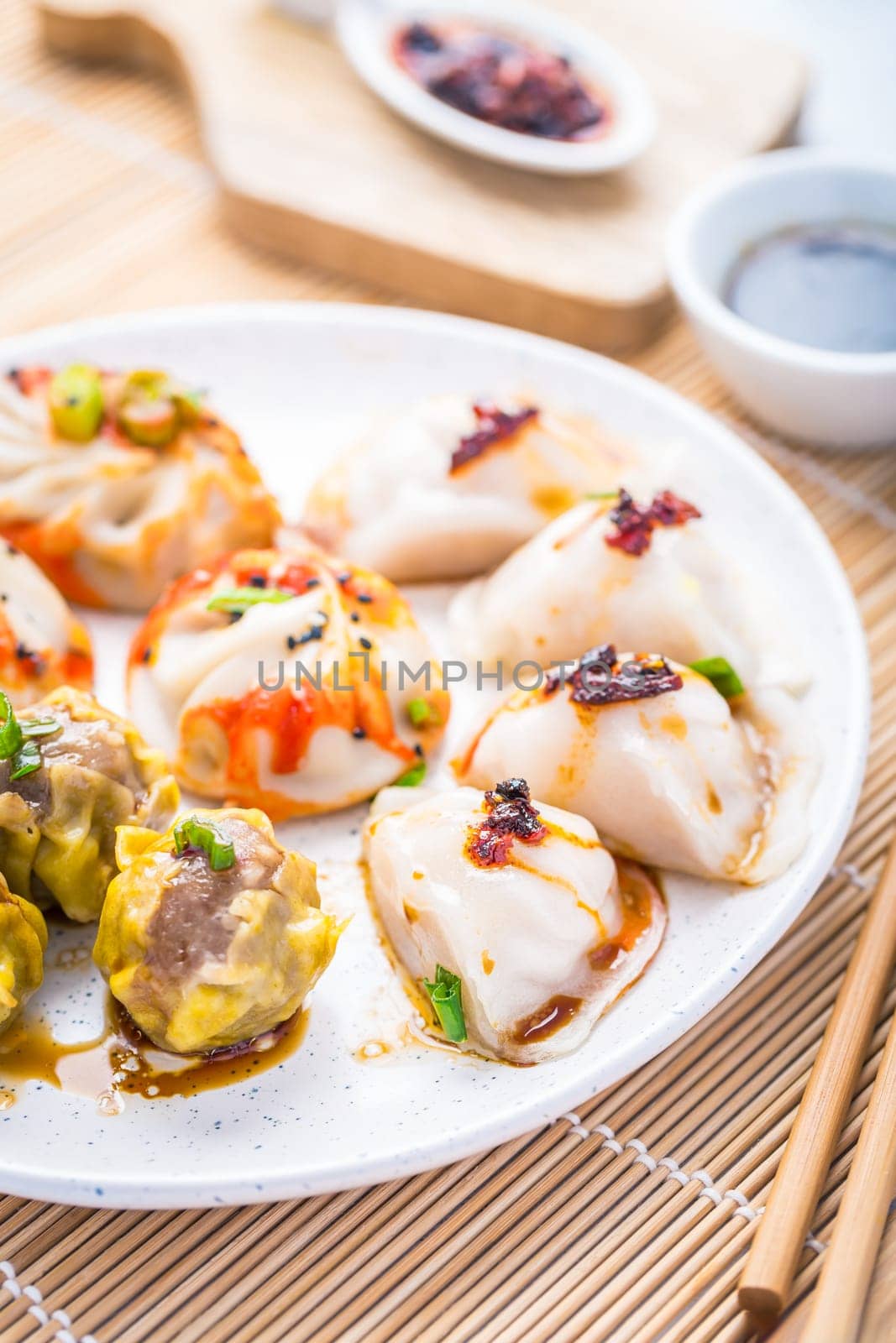 Assortment of steamed dumplings Dim Sum on kitchen table