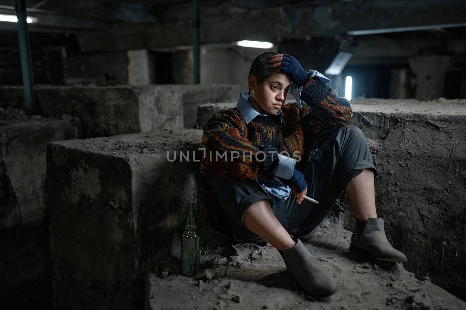 Depressed teenager woman beggar feeling disappointment sitting and smoking