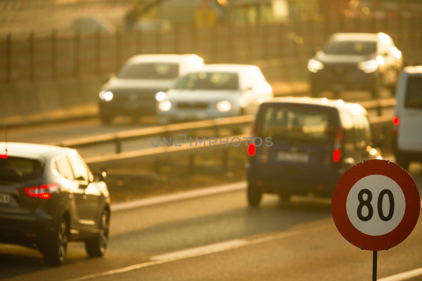 Heavy morning city traffic/congestion concept - cars going very slowly in a traffic jam during the morning rushhour