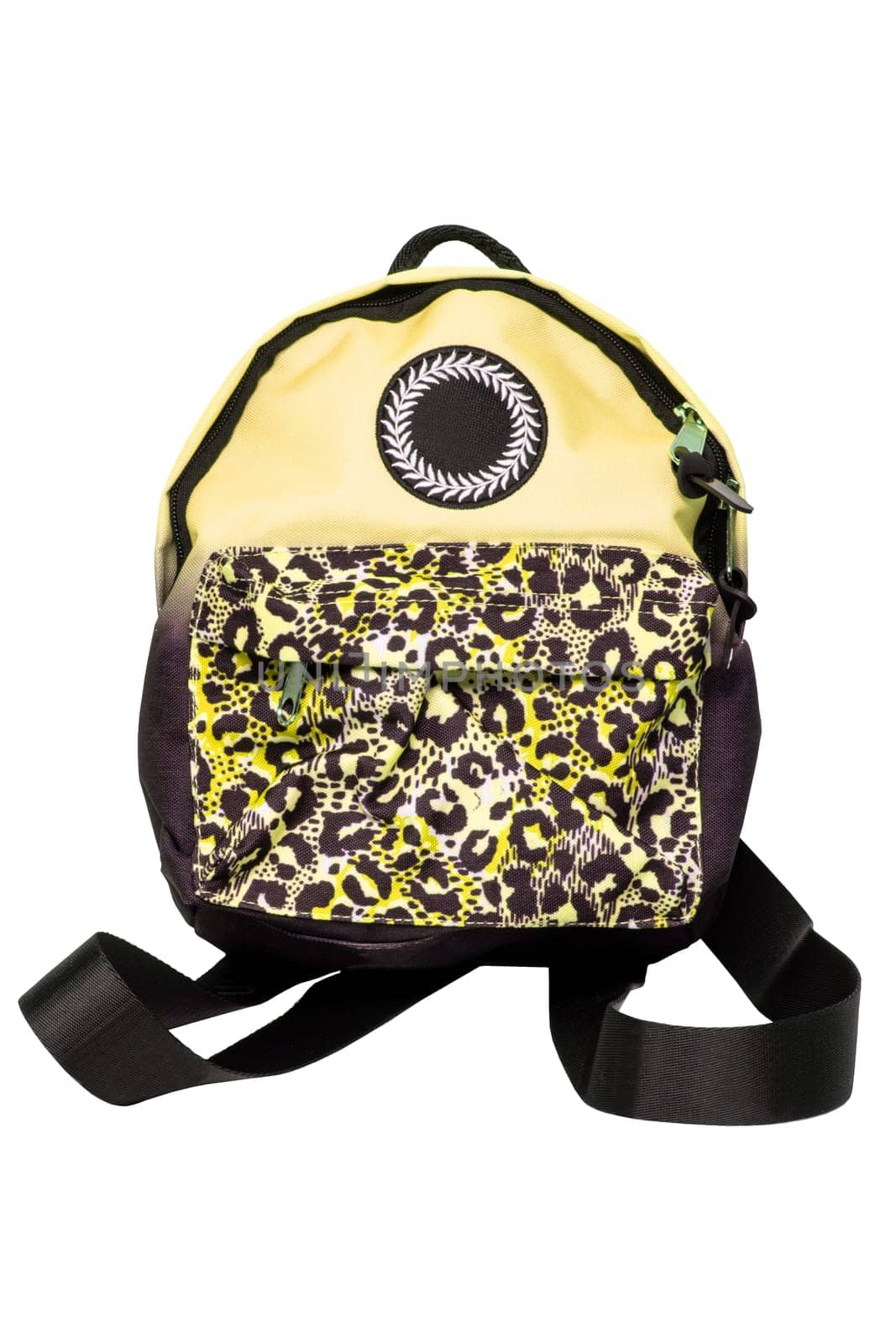 Closeup of a colorful yellow comfortable school backpack isolated on a white background. Concept back to school. Macro.