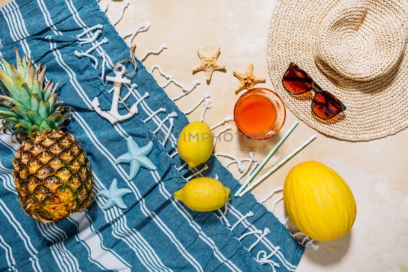 Summer holiday concept, summer accessories with refreshing juice and fresh fruits