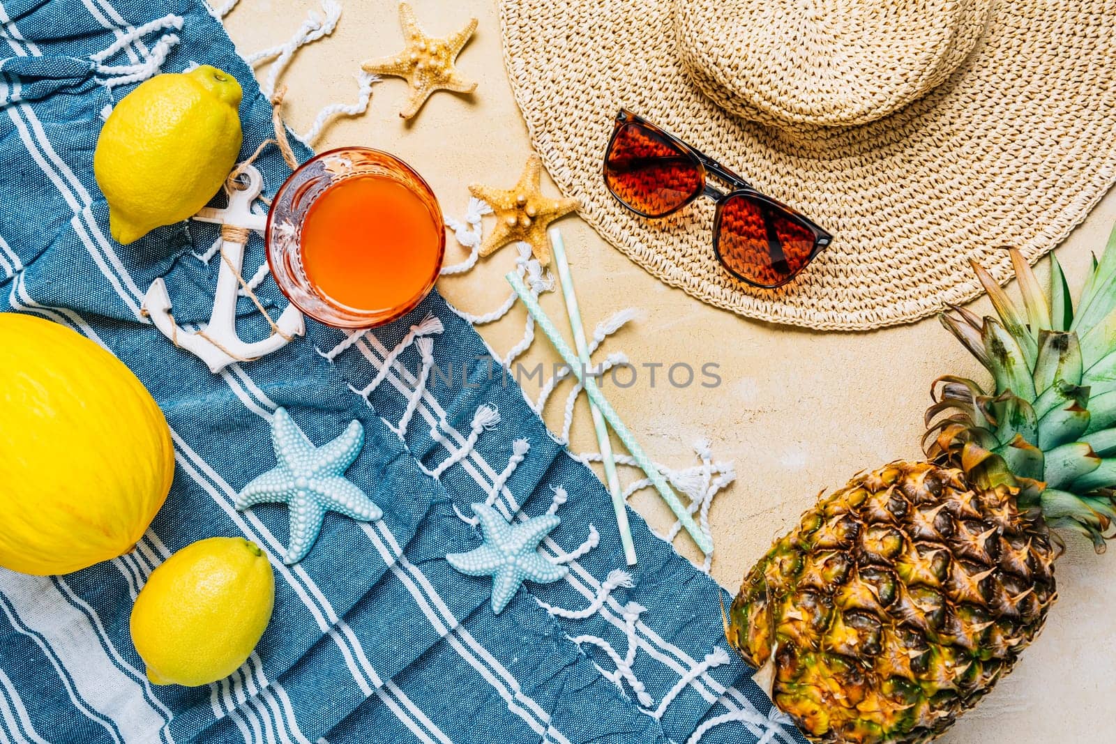 Summer holiday concept, summer accessories with refreshing juice and fresh fruits