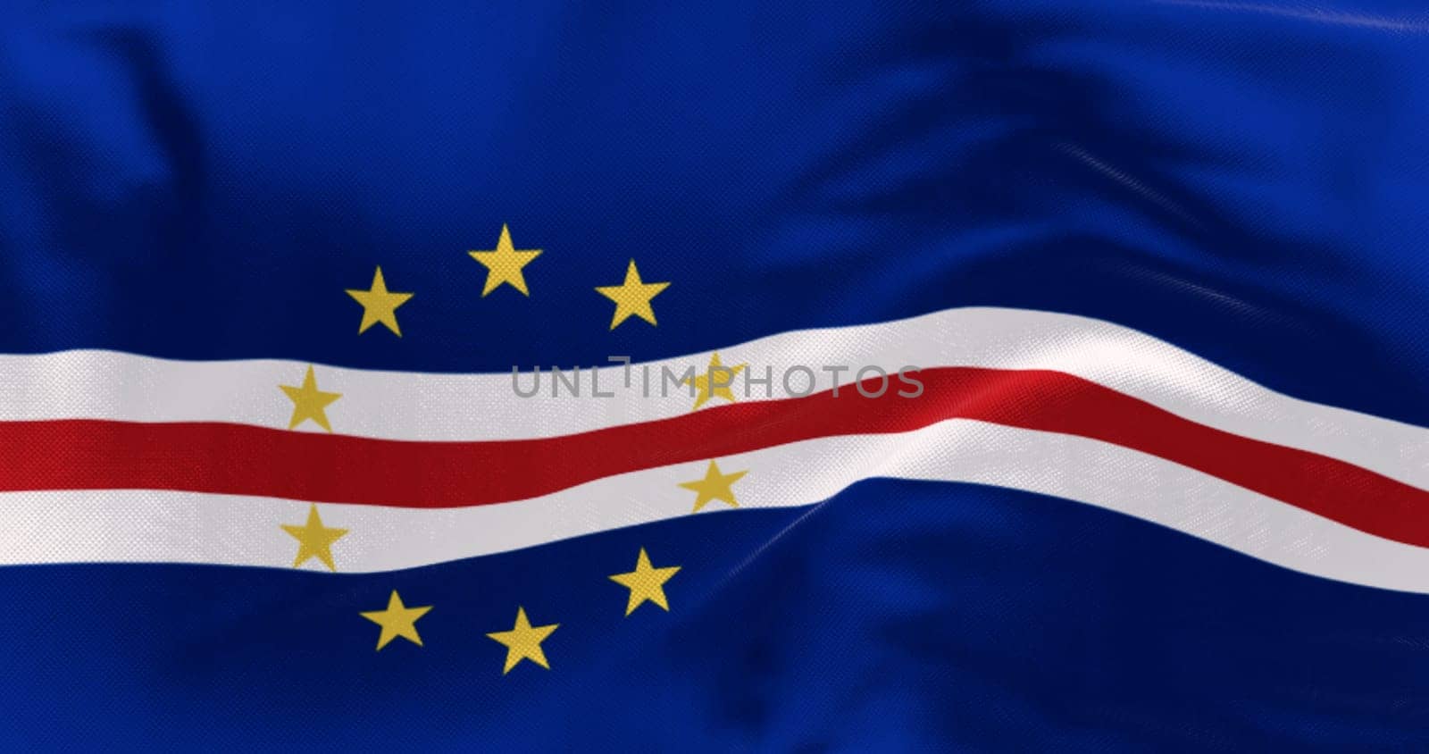 Close-up of the national flag of Cape Verde waving in the wind. Blue, white, and red bands with ten yellow stars representing the main islands. 3d illustration render. Fluttering fabric background