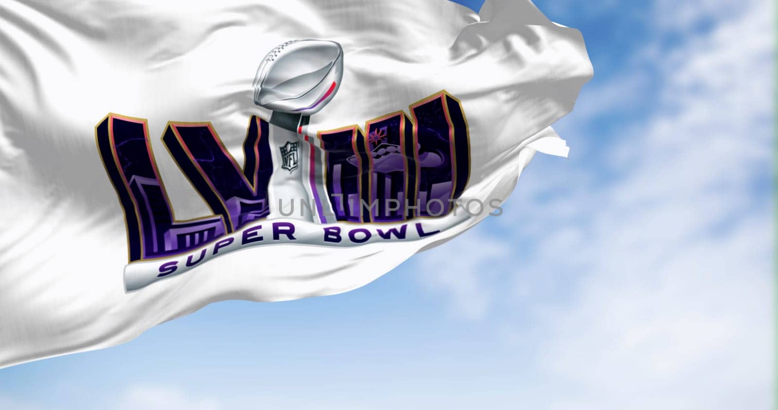 Paradise, US, June 24 2023: 58th Super Bowl flag waving on a clear day. The game is scheduled to be played on Feb 11, 2024 in Paradise, Nevada. Illustrative editorial 3d illustration render