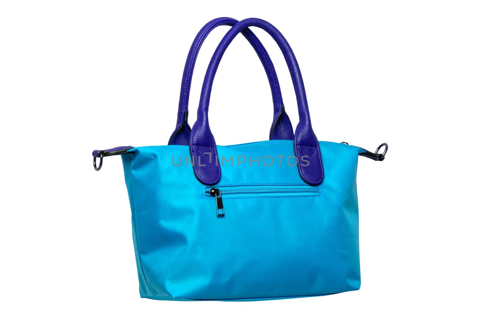 Stylish women's handbag. A fashionable female blue luxury handbag isolated on white. Fashionable womans accessories. Advertising.