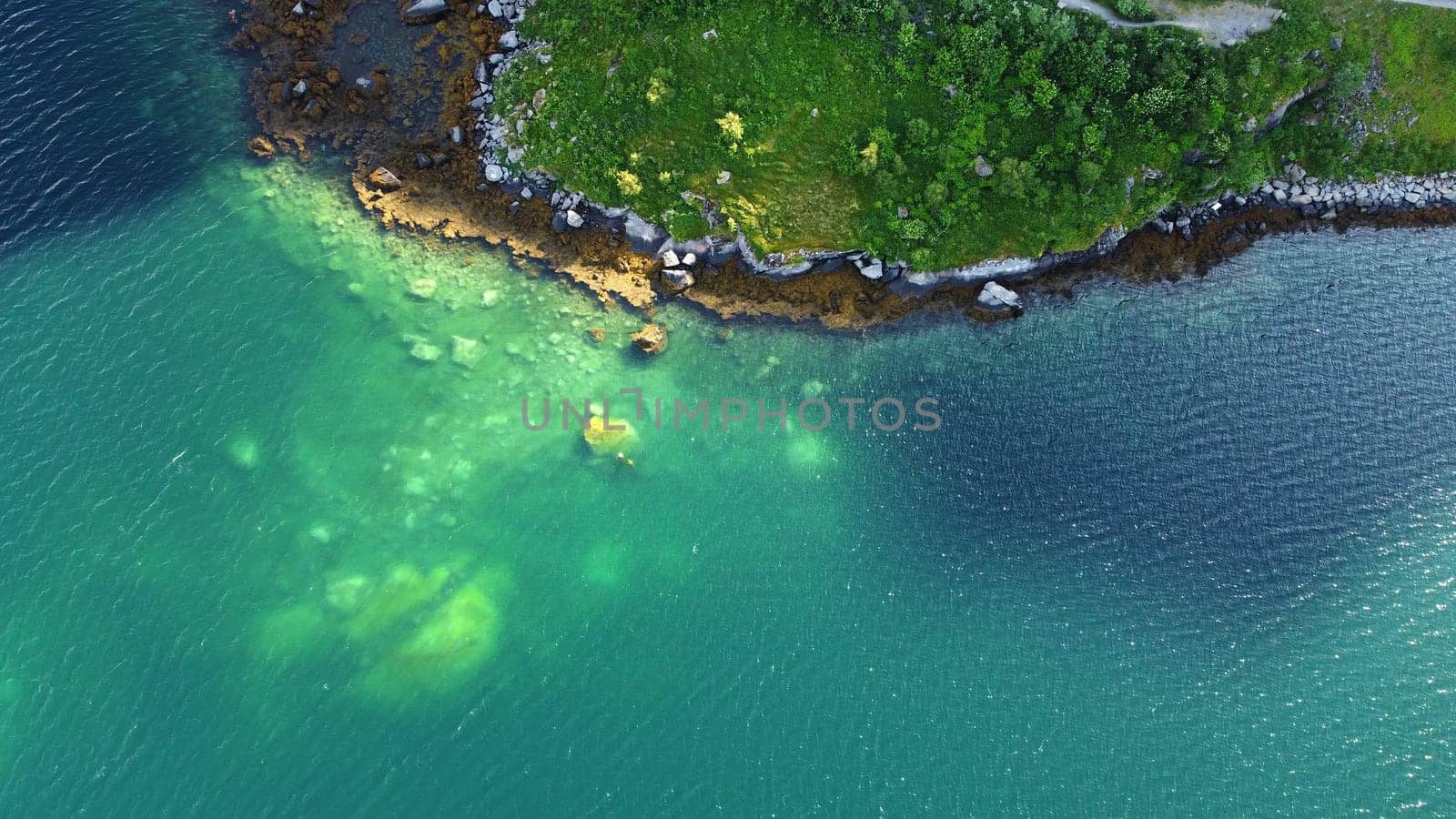 Drone photo of a beautiful coast with stones by the sea in Norway