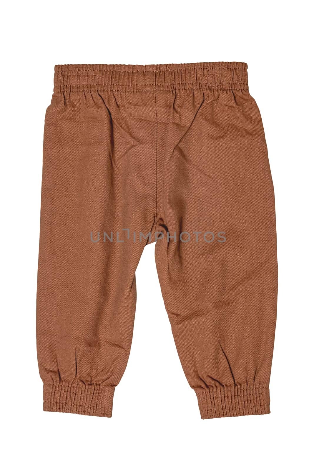 Clothes for newborn. Stylish brown baby pants or sweatpants isolated on white background. Clipping path. Baby clothes. Kids trousers.