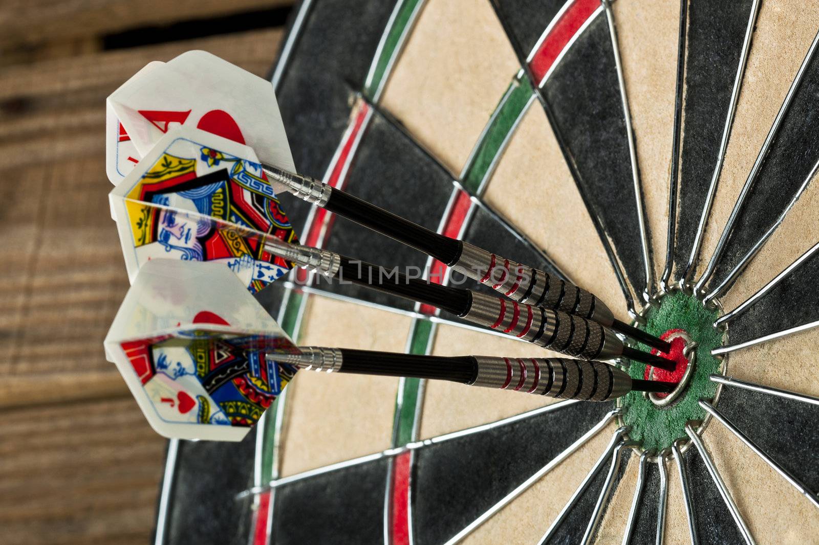 close up cropped image of the dart board with pins by kozzi