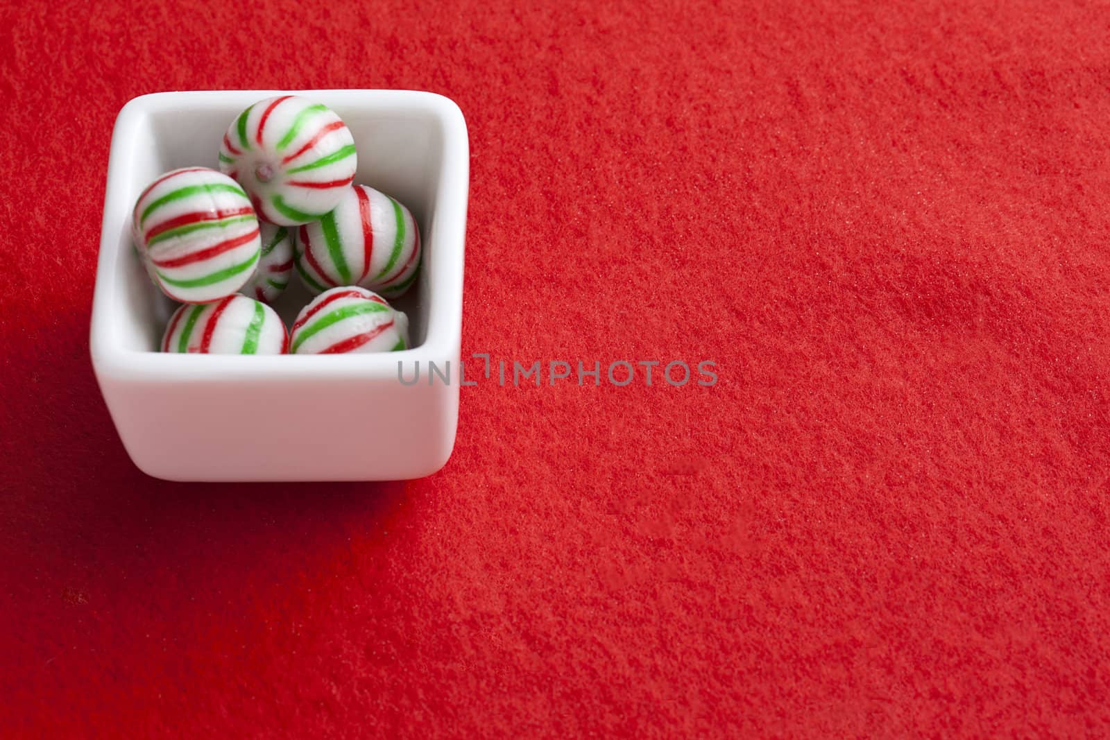 a bowl of candy by kozzi