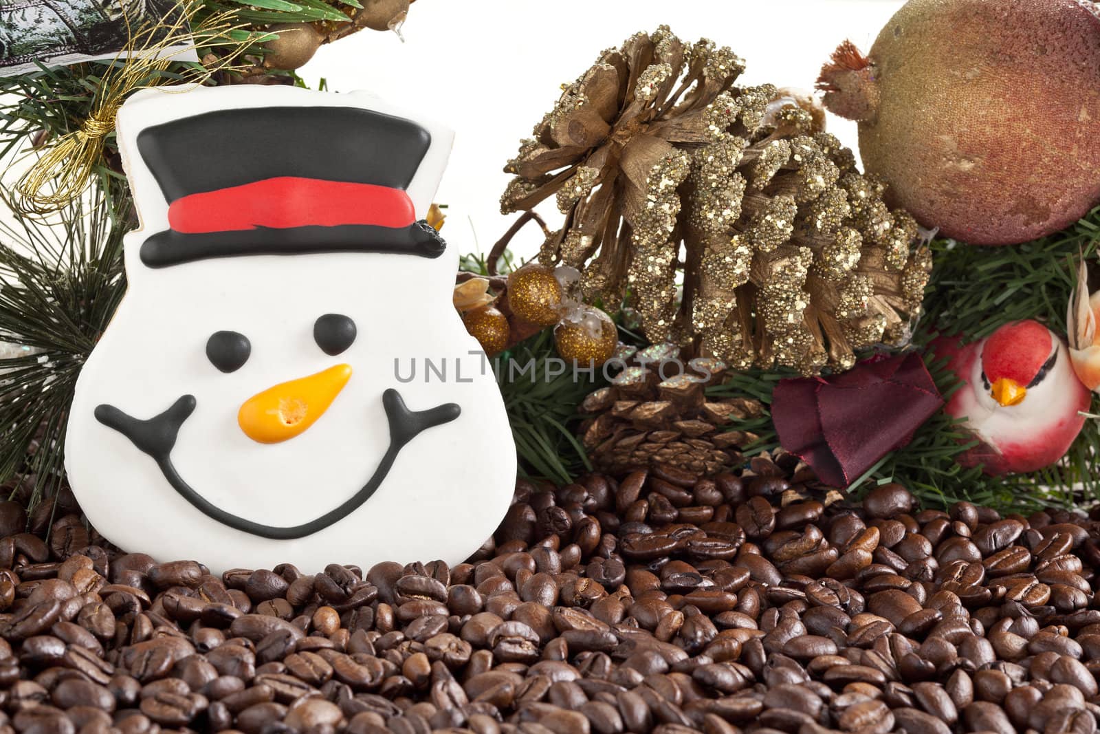 Snow man face cookies with christmas decor and coffee beans 