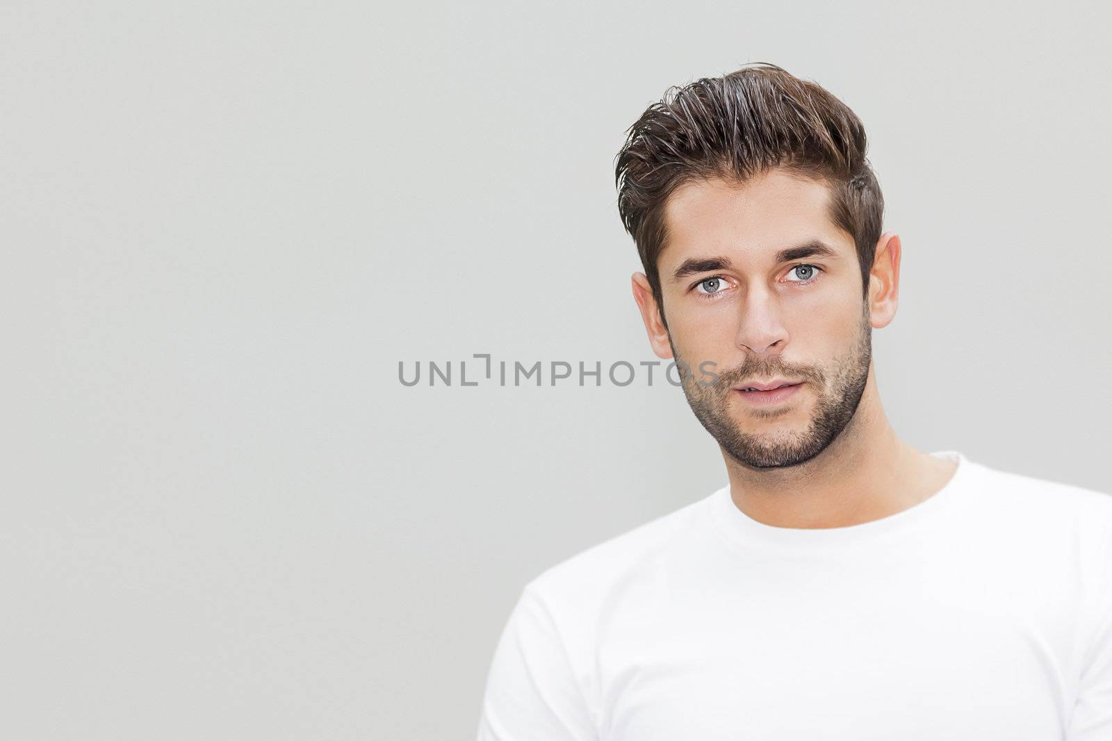 An image of a handsome young male portrait with space for your content