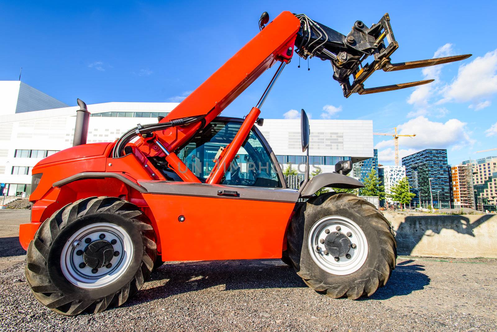 skid steer loader at construction area near Oslo Opera House