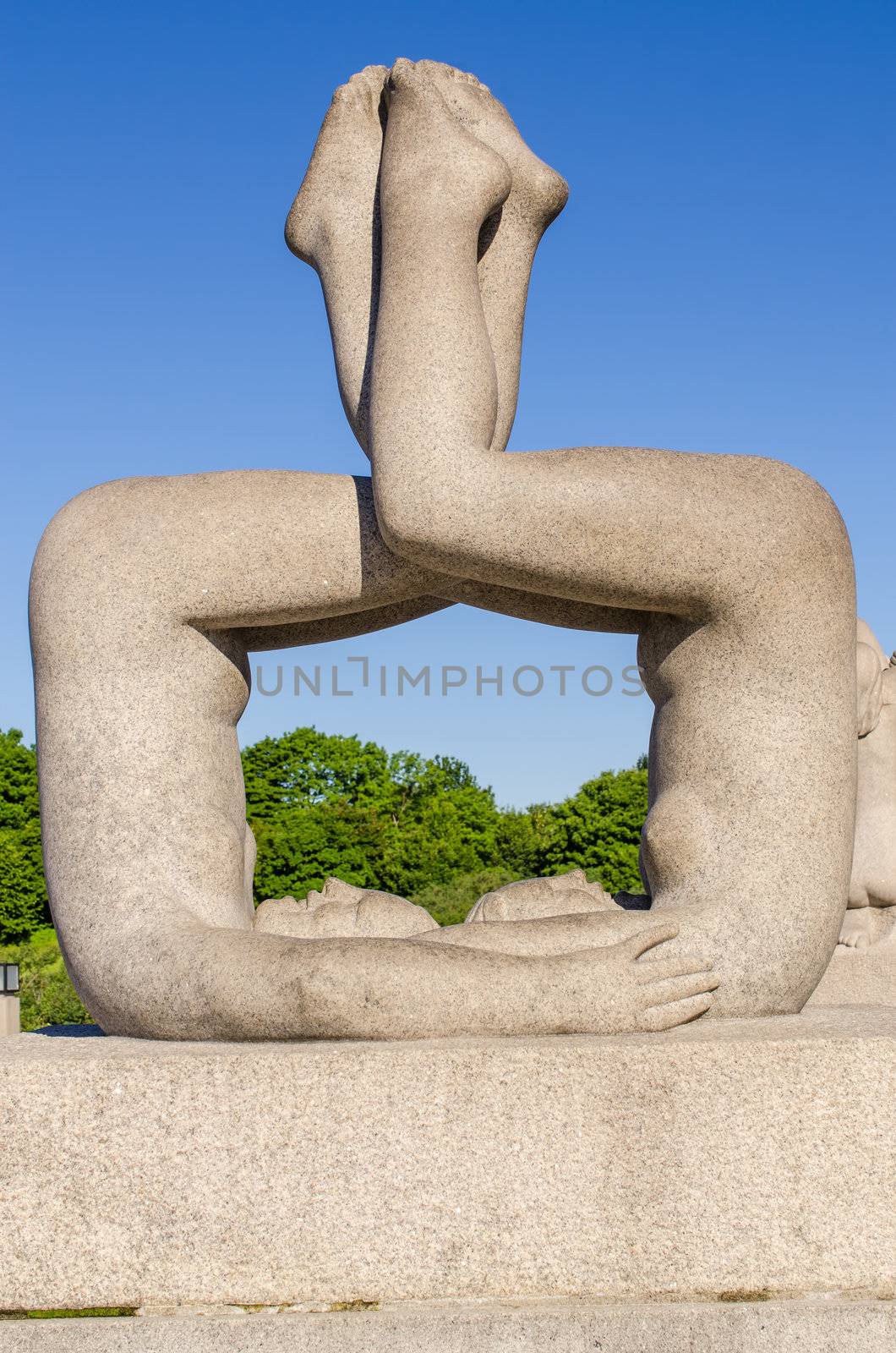 OSLO, NORWAY - JUNE 19: Statues in Vigeland park in Oslo, Norway on June 19, 2012.The park covers 80 acres and features 212 bronze and granite sculptures created by Gustav Vigeland.