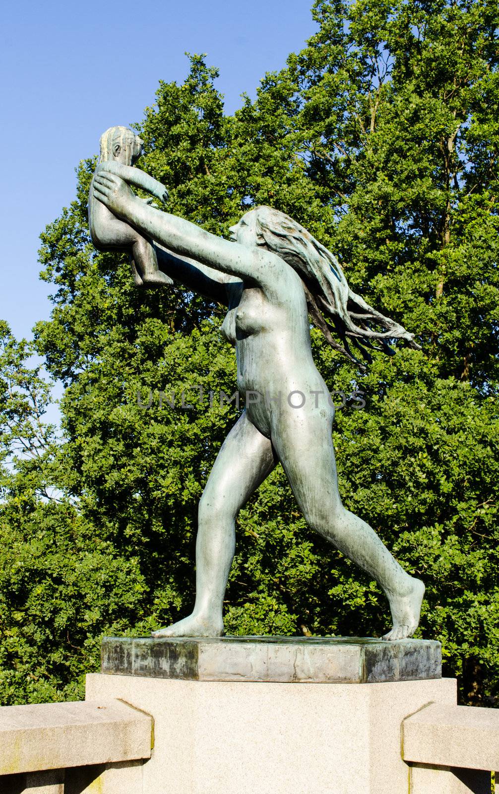 OSLO, NORWAY - JUNE 19: Statues in Vigeland park in Oslo, Norway on June 19, 2012.The park covers 80 acres and features 212 bronze and granite sculptures created by Gustav Vigeland.