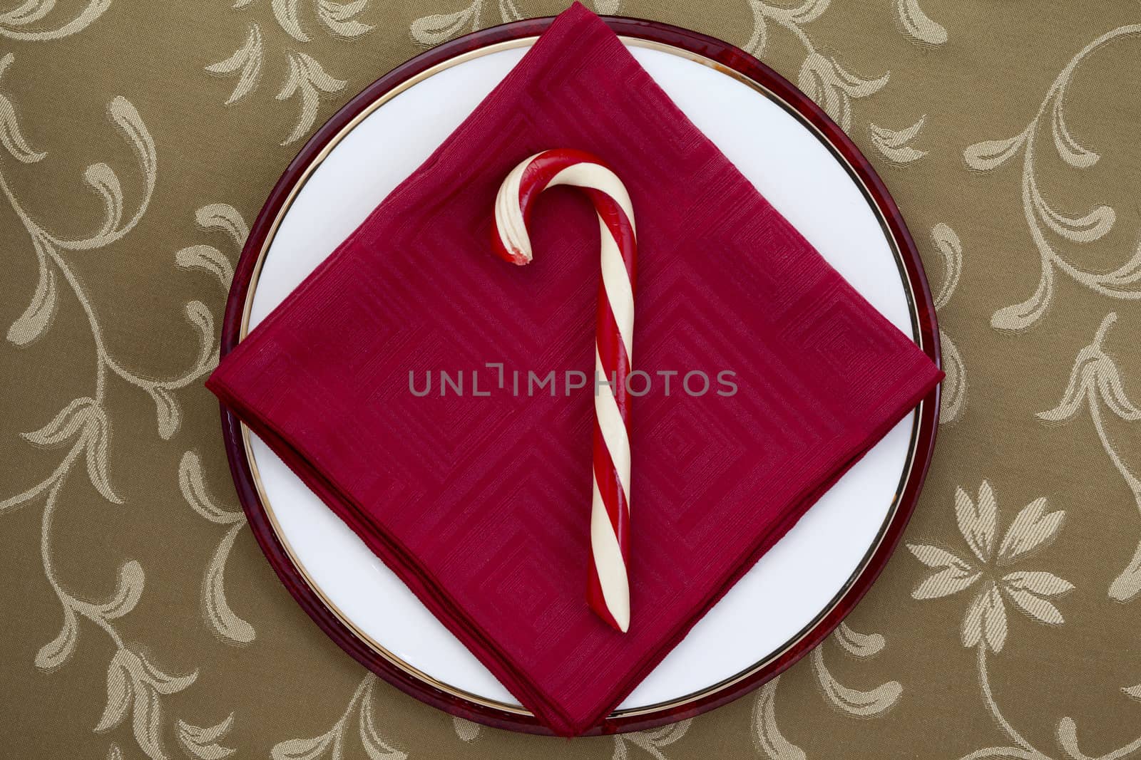 Image of candy cane with red table napkin