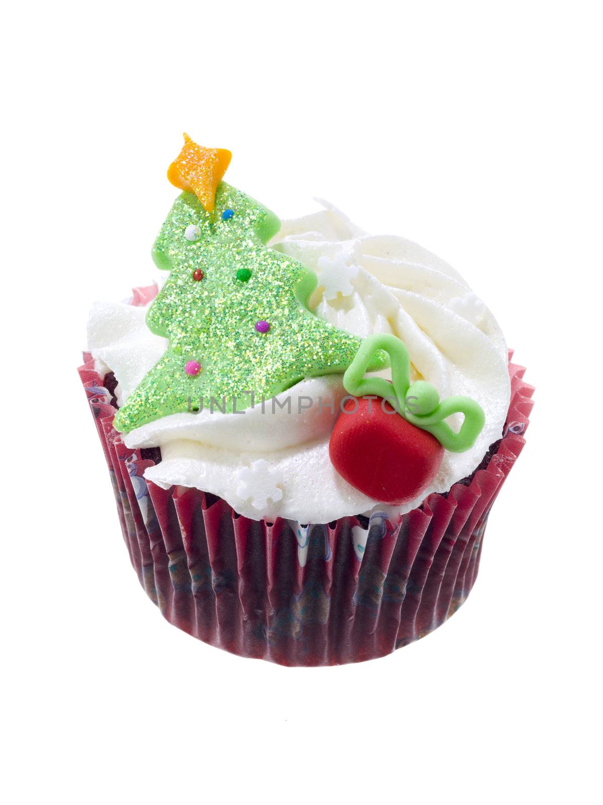 Vertical image of Christmas theme cupcake over the white background 