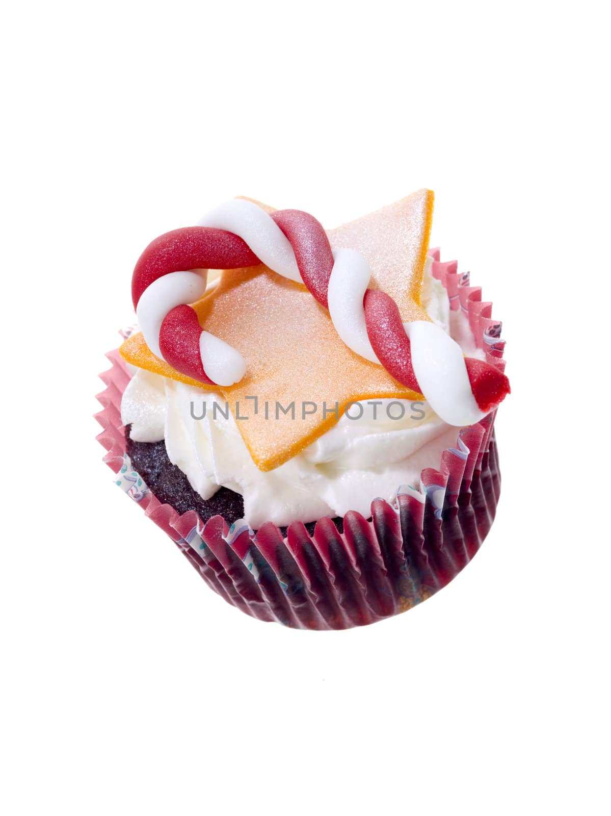 Cupcake with frosting candy cane and star toppings