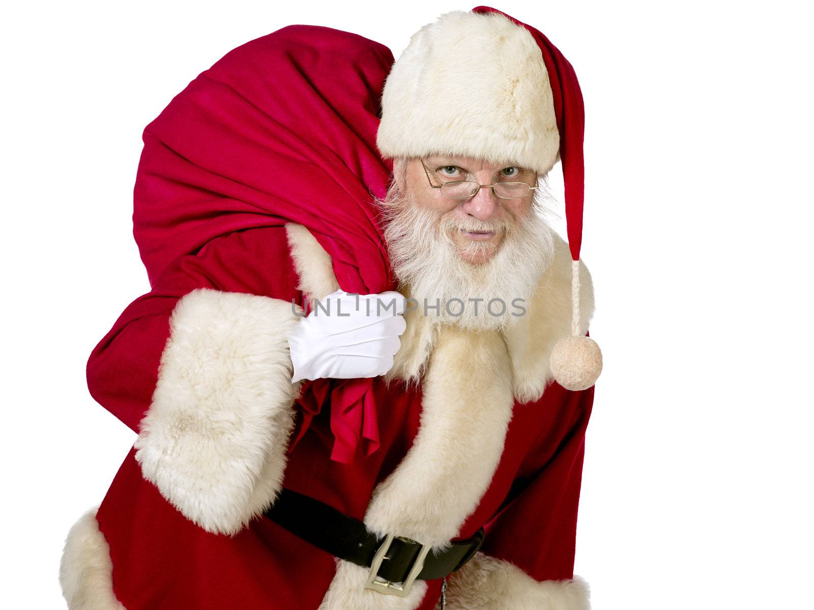 Front view portrait of Father Santa Claus with gift bag. Model: Larry Lantz