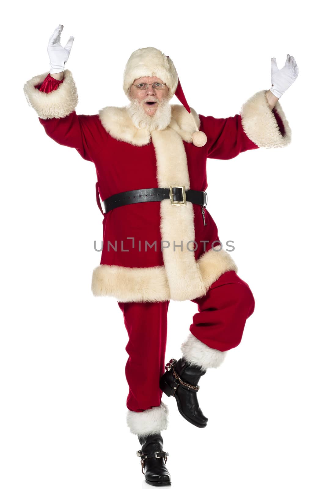 Close-up of Santa Claus dancing over white background