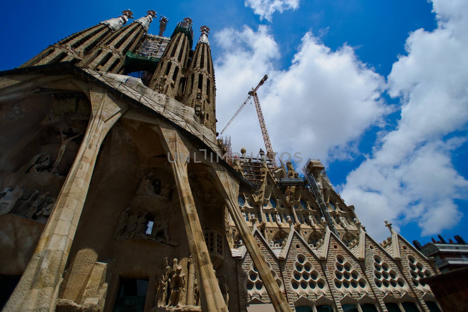 BARCELONA, SPAIN - JULY 13, 2012: Sagrada Familia on July 13: La Sagrada Familia - the impressive cathedral designed by Gaudi, which is being build since 19 March 1882 and is not finished yet.