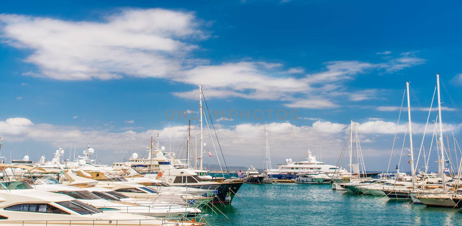 Marina with yachts and boats by Nanisimova