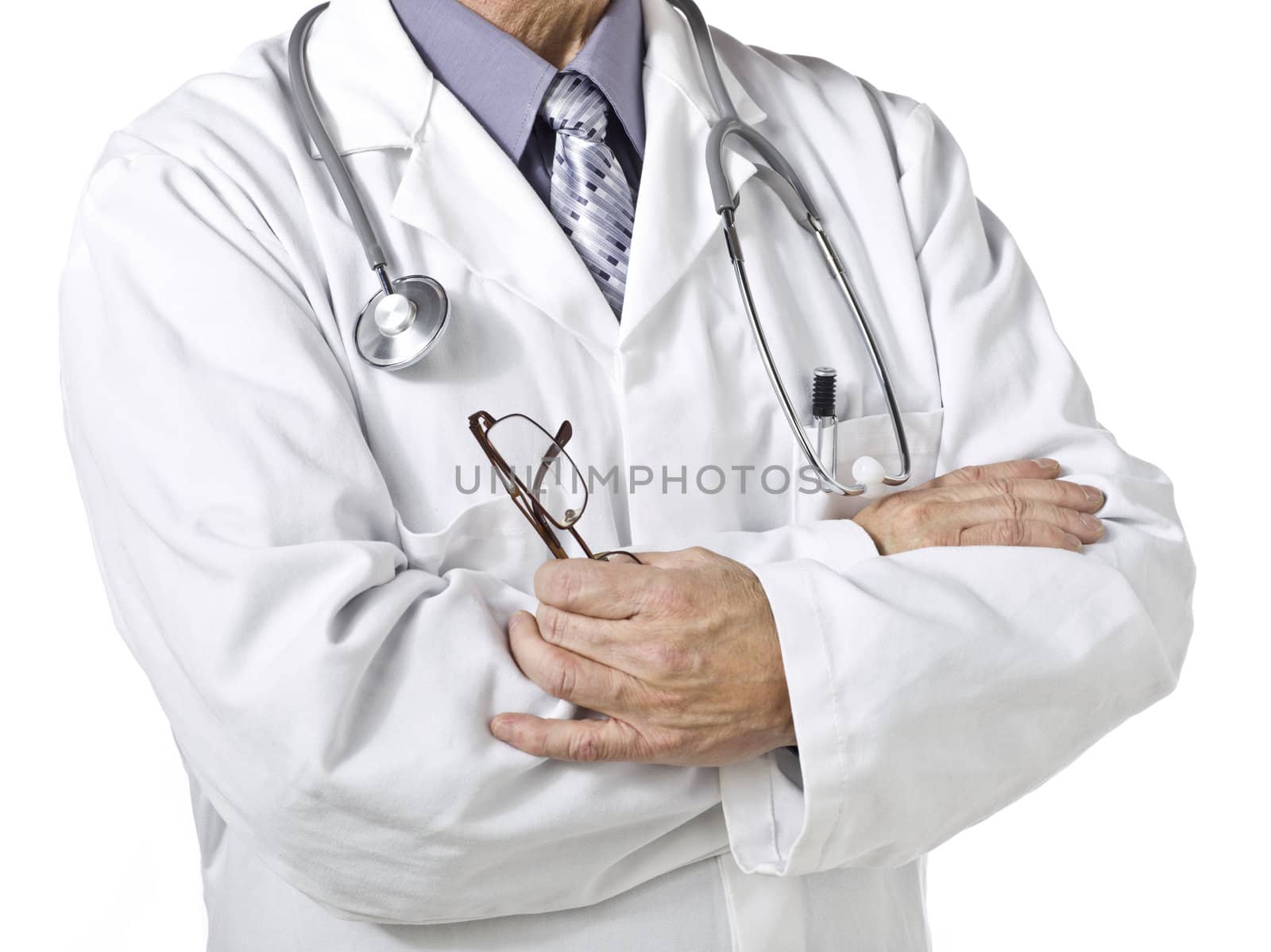 Cropped image of a male doctor with the camera focused on his shoulder and crossed arms